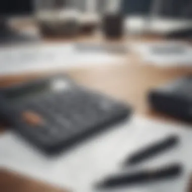 A calculator and financial documents on a desk